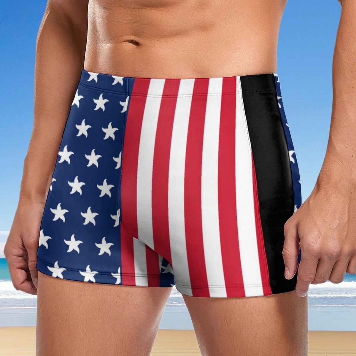 Person wearing American flag patterned swim shorts with a beach background