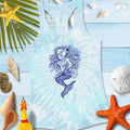 Mermaid Zen Tangle Tie Dye Tank Top displayed on a beach-themed background with seashells and starfish.