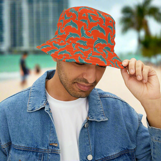 Dude wearing a Bongo Beachwear Bucket Hat in Miami Dolphin Team colors hanging out at South Beach in Miami
