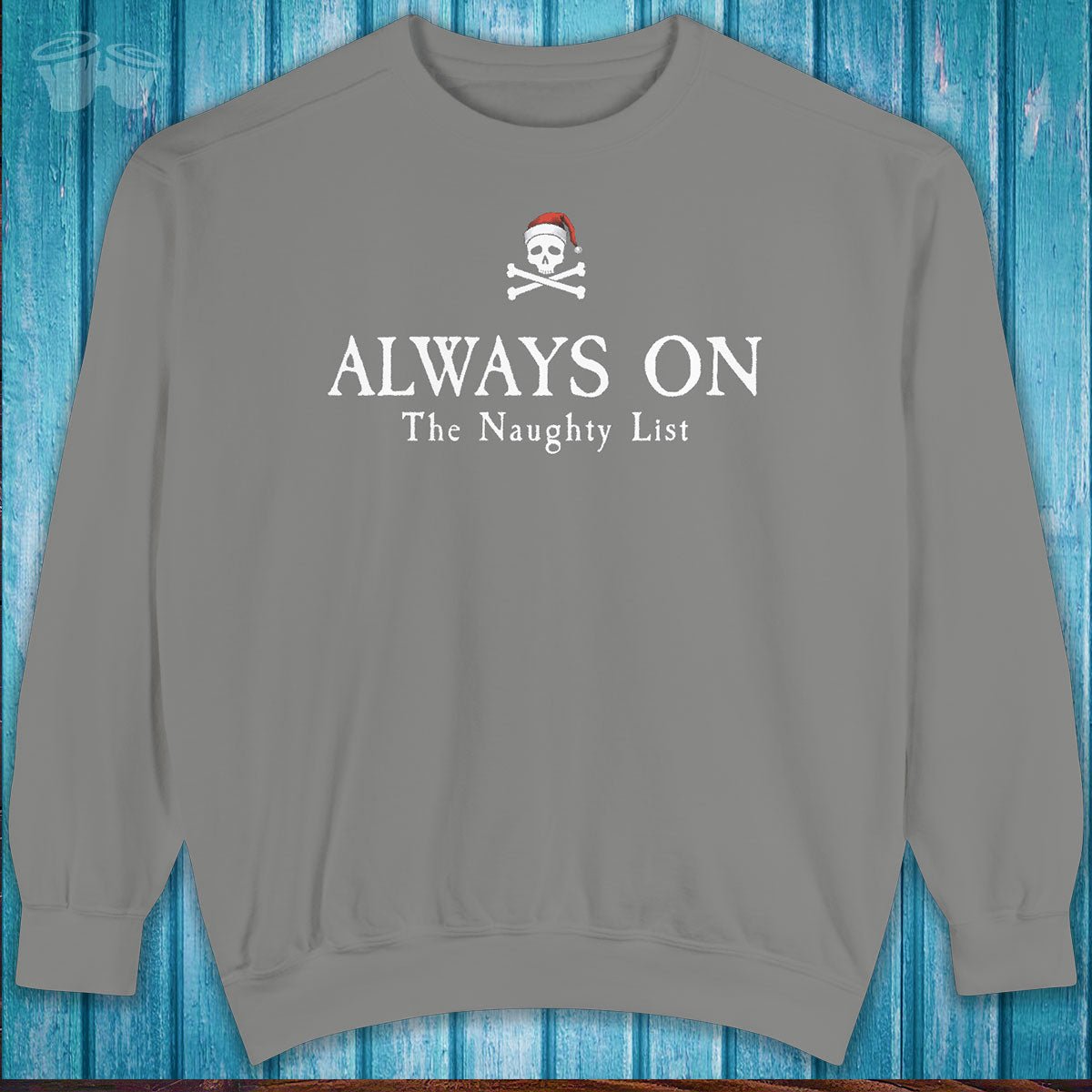 Gray sweatshirt with a skull and crossbones design and text on a blue wooden background