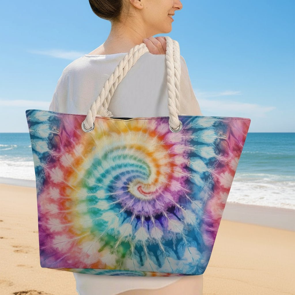 Person holding a tie-dye bag with a spiral pattern in an outdoor setting