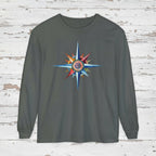 Gray long-sleeve shirt with a colorful star design on a wooden background