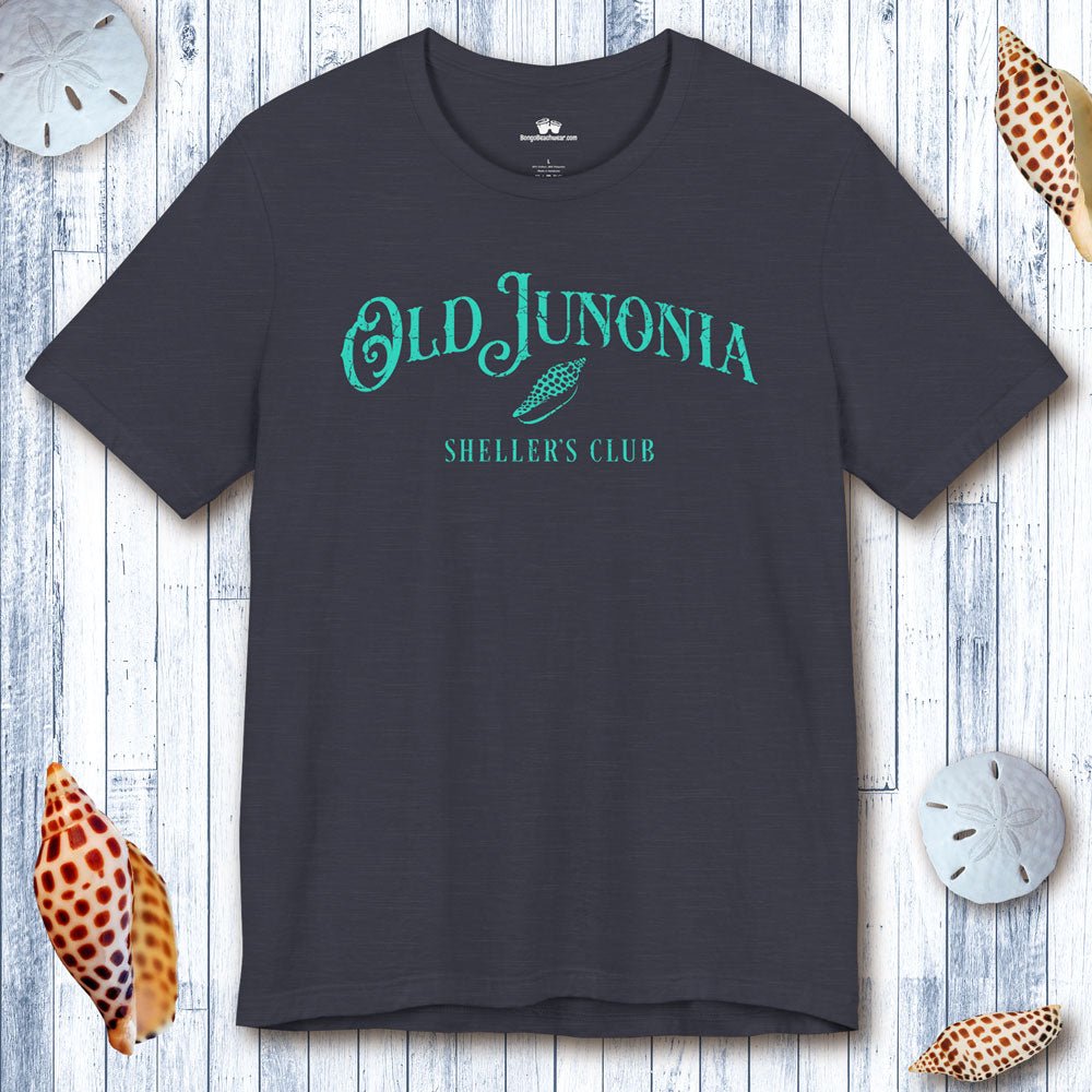 Navy blue t-shirt with 'Old Junonia Sheller's Club' text on a wooden surface with shells.