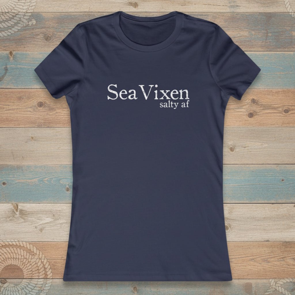 Black t-shirt with a graphic design on a rustic nautical wood background