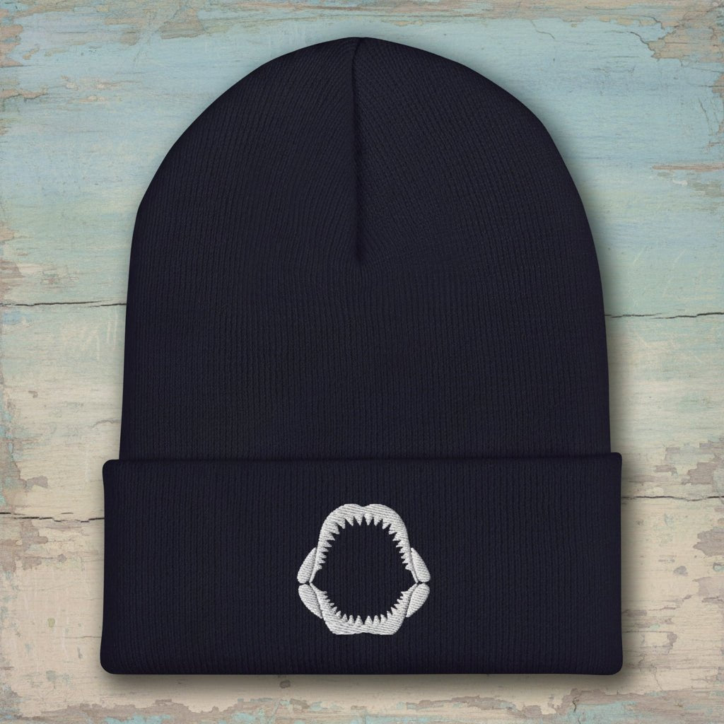 Navy beanie with a white crown emblem on a white background