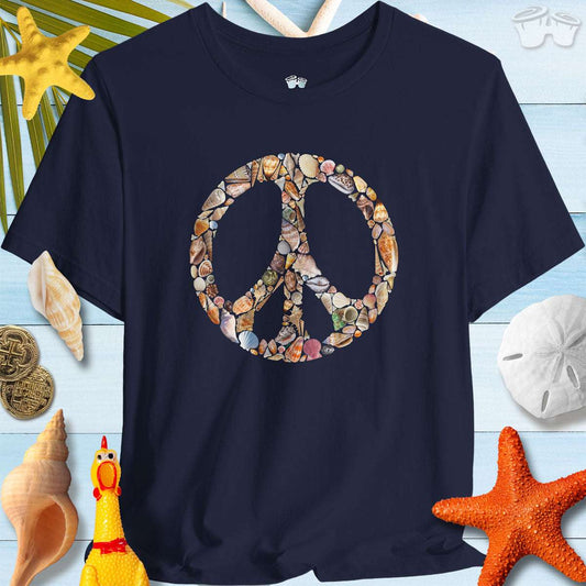 Shelling Tee featuring a peace sign made out of seashells against a beach-inspired background.