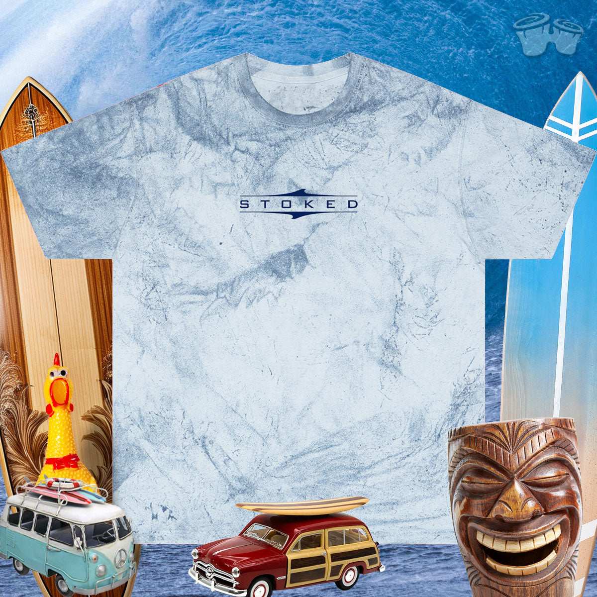 Stoked Surfer Vibe Garment Dyed T-Shirt 🤙 Over a background of Surfboards, Beach Wagon, A Laughing Tiki and a Rubber Chicken