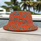 Bucket hat in Miami Dolphin Team Colors sitting on park bench in south beach