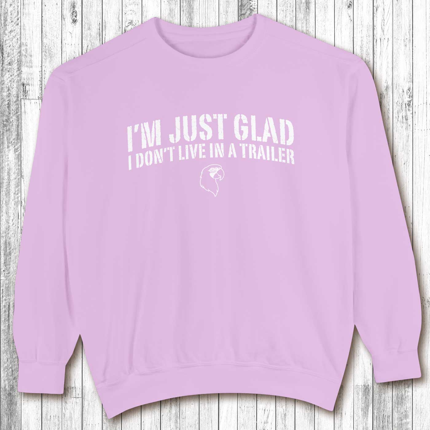Purple sweatshirt with text on a wooden background