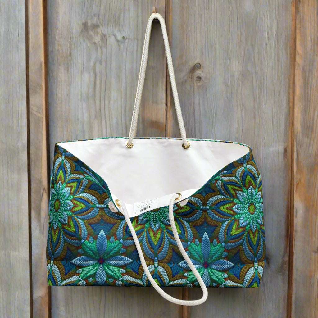 Crochet pattern printed on an oversized tote bag hanging from a peg ith wall of a seafood shack
