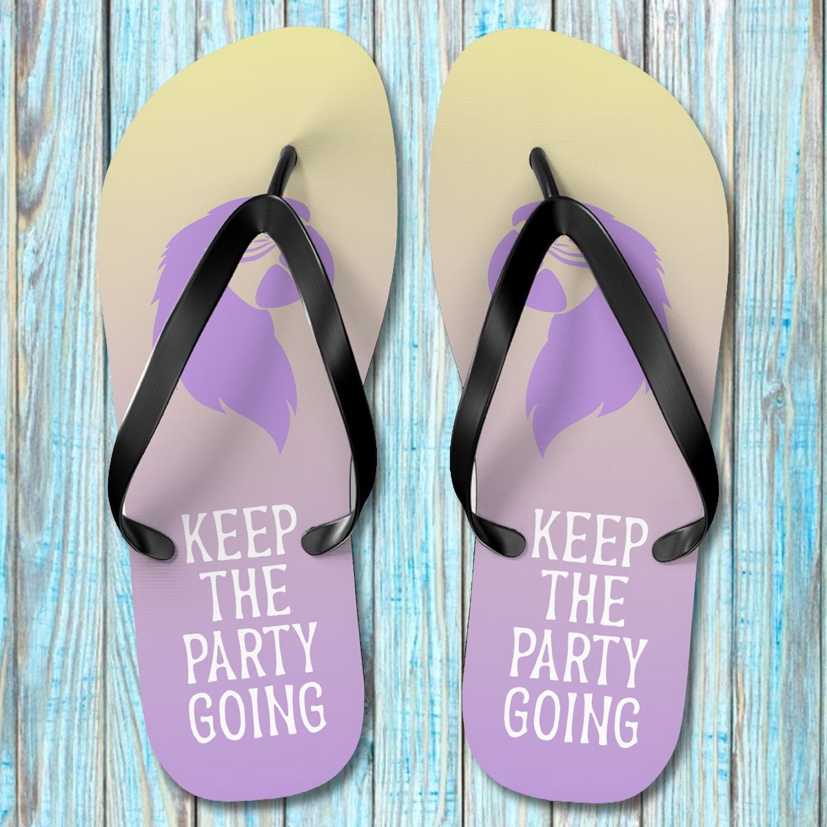Pair of ParrotHead Flip-Flops with purple soles and black straps on a wooden surface.