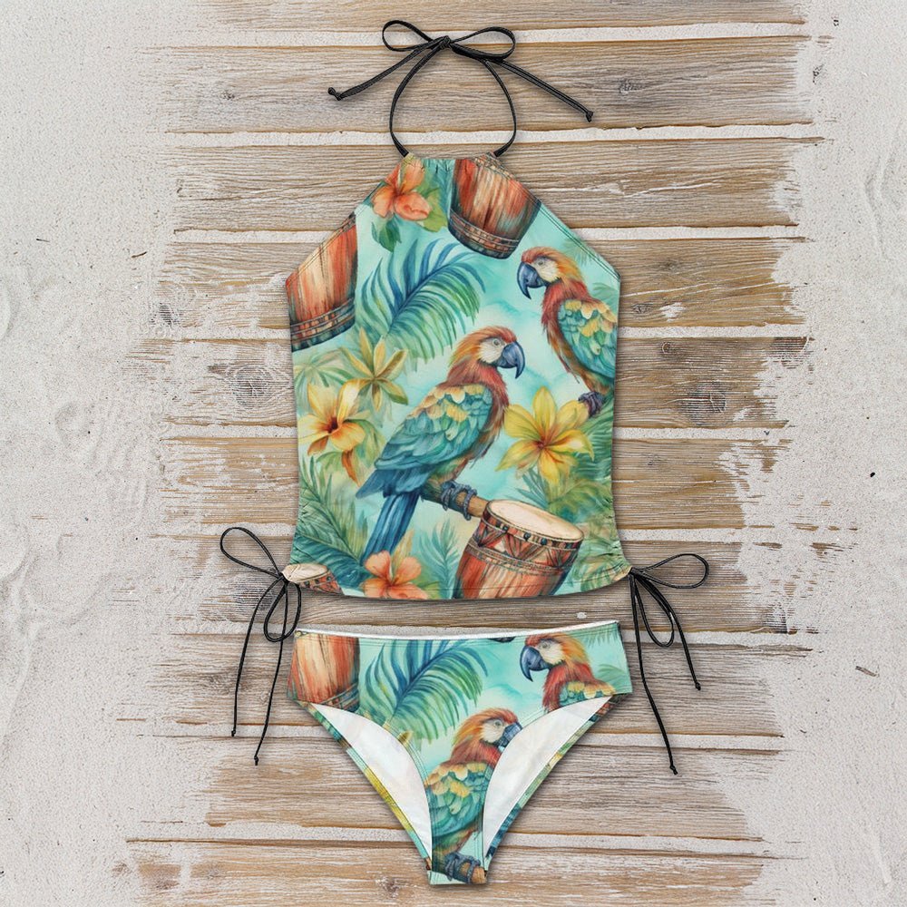 Tropical-themed bikini set with parrot design on a wooden surface