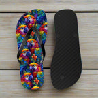 Flip-flop with colorful parrot design and black insole on a nautical wood background