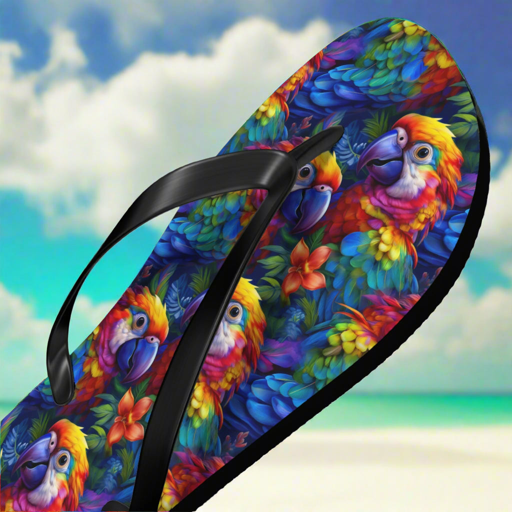 Flip-flop with colorful parrot design on a beach background