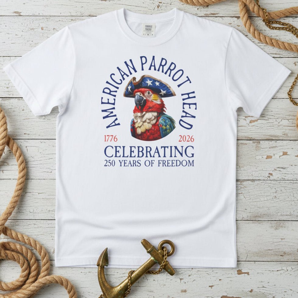 White t-shirt with 'American Parrot Head' graphic and text on a nautical wood background