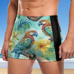Tropical-themed swim shorts with parrot design on a beach background