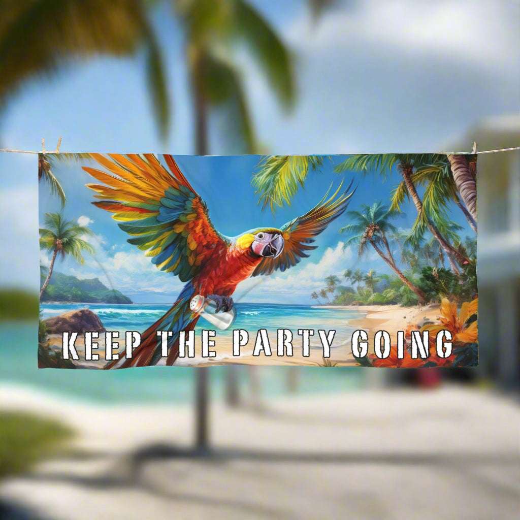 Beach towel featuring a parrot flying away with Jimmy Buffett's lost shaker of salt, handing on a line in Key West