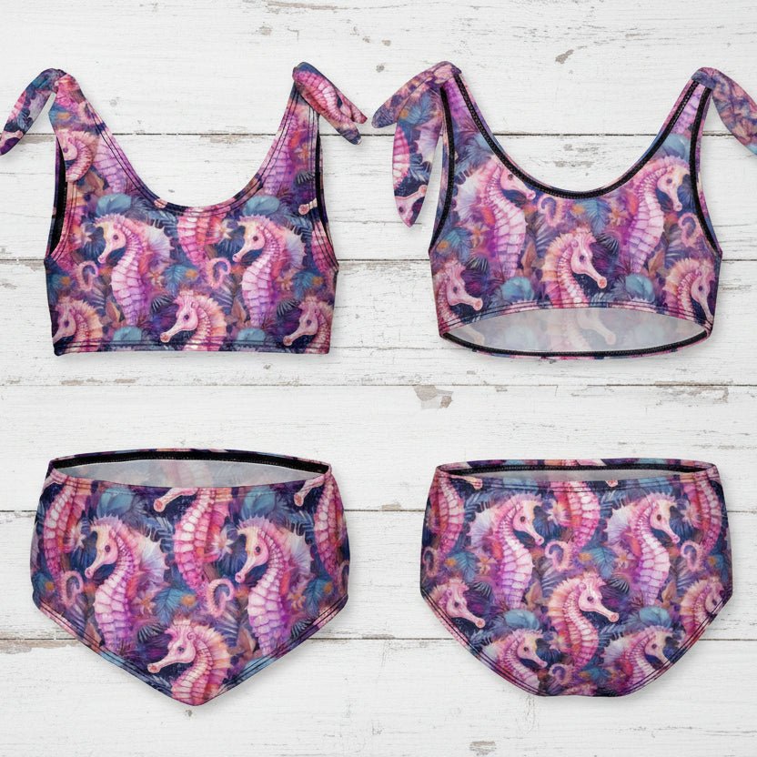Multicolored seahorse-patterned bikini set on a rustic nautical wood background