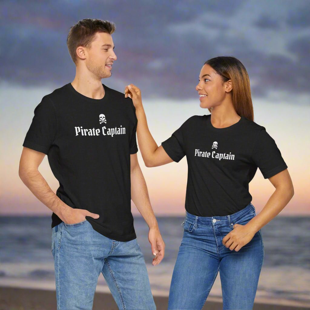Couple wearing Pirate Captain T-shirts on the beach