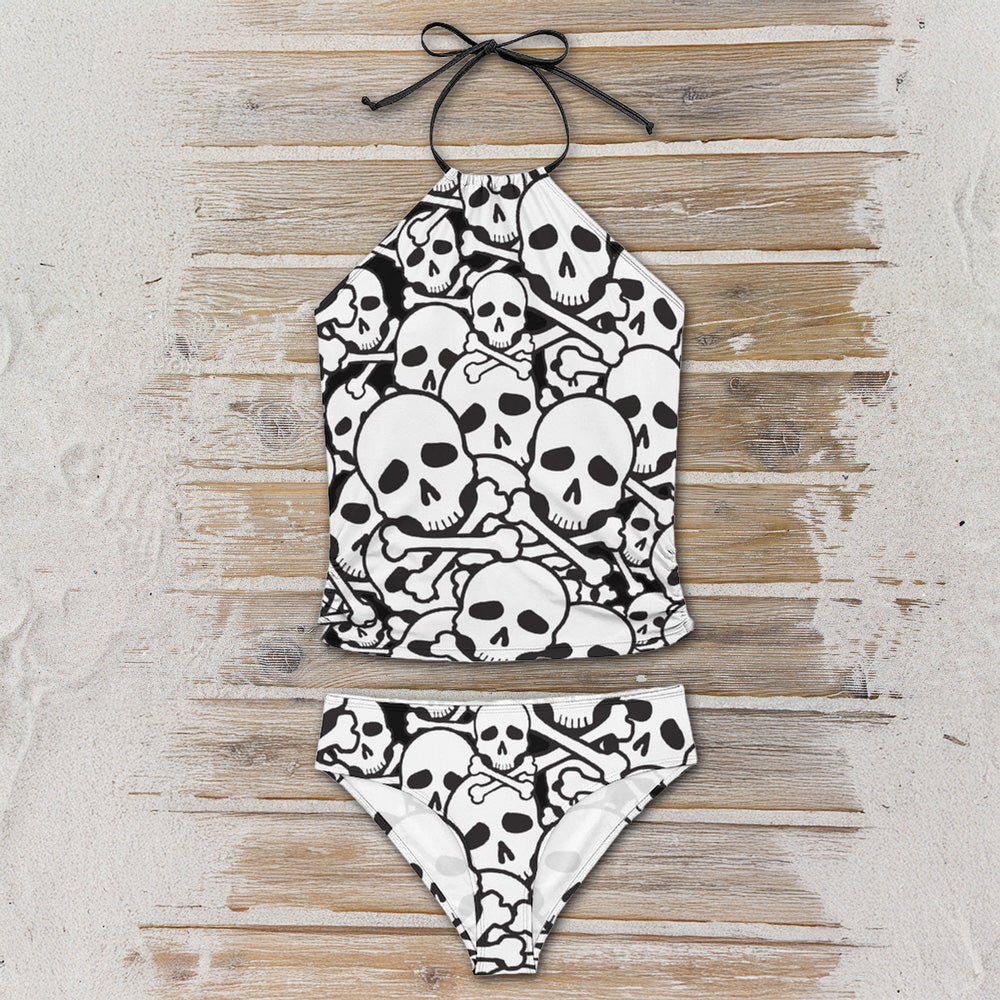 Skull and crossbones patterned bikini set on a wooden surface