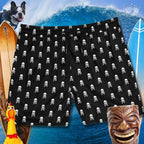 Pirate Swim Shorts with black cord and skull and crossbones in a fun polka dot pattern. in front of a huge wave a couple of surfboards a laughing tiki and a rubber chicken