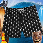Men's bathing trunks with a polka dot pattern of Jolly Roger Pirate Skulls on a surfy background with a surfboards, a big wave and a laughing tiki pole.
