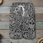 Black and white patterned shorts on a nautical wood background