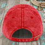 Red cap on a wooden surface with a rustic background