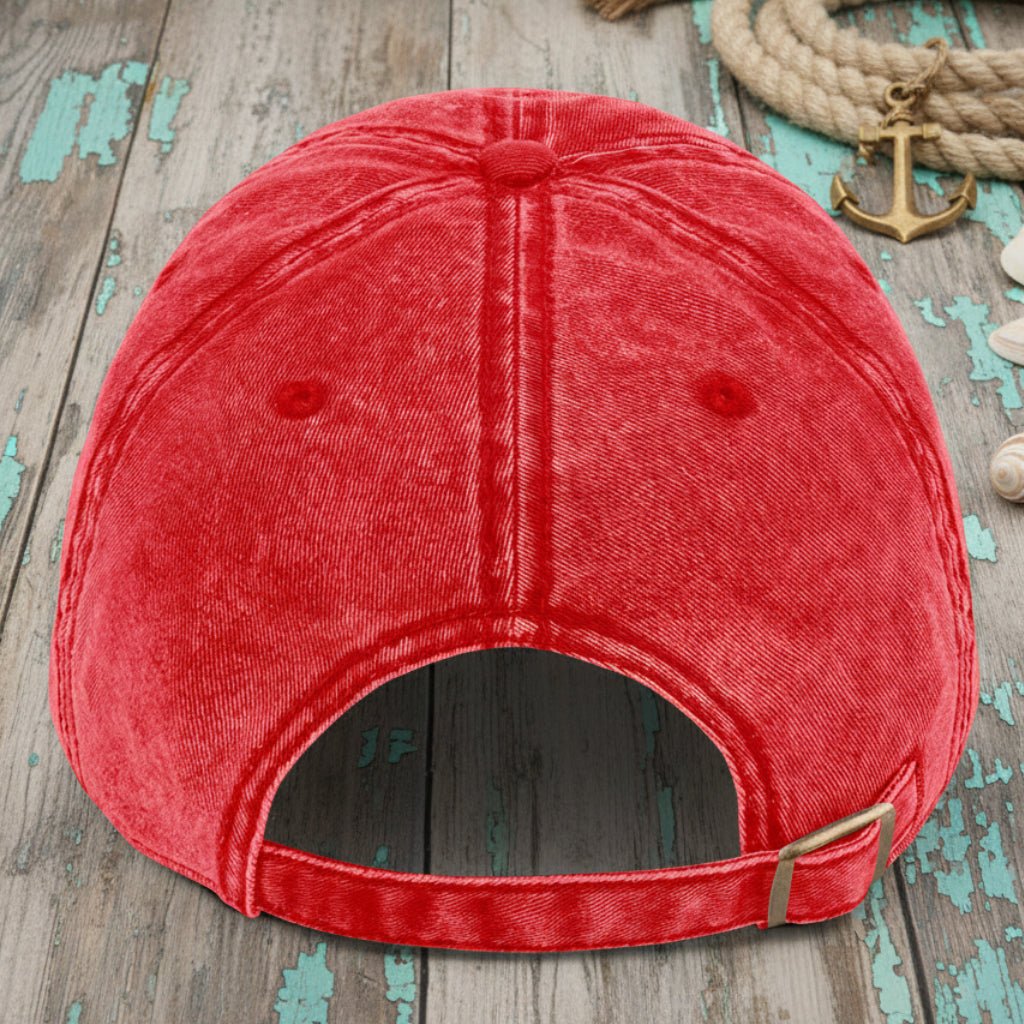 Red cap on a wooden surface with a rustic background