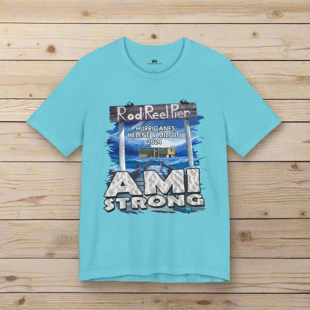 Light blue t-shirt with 'AMI Strong' graphic on a white background