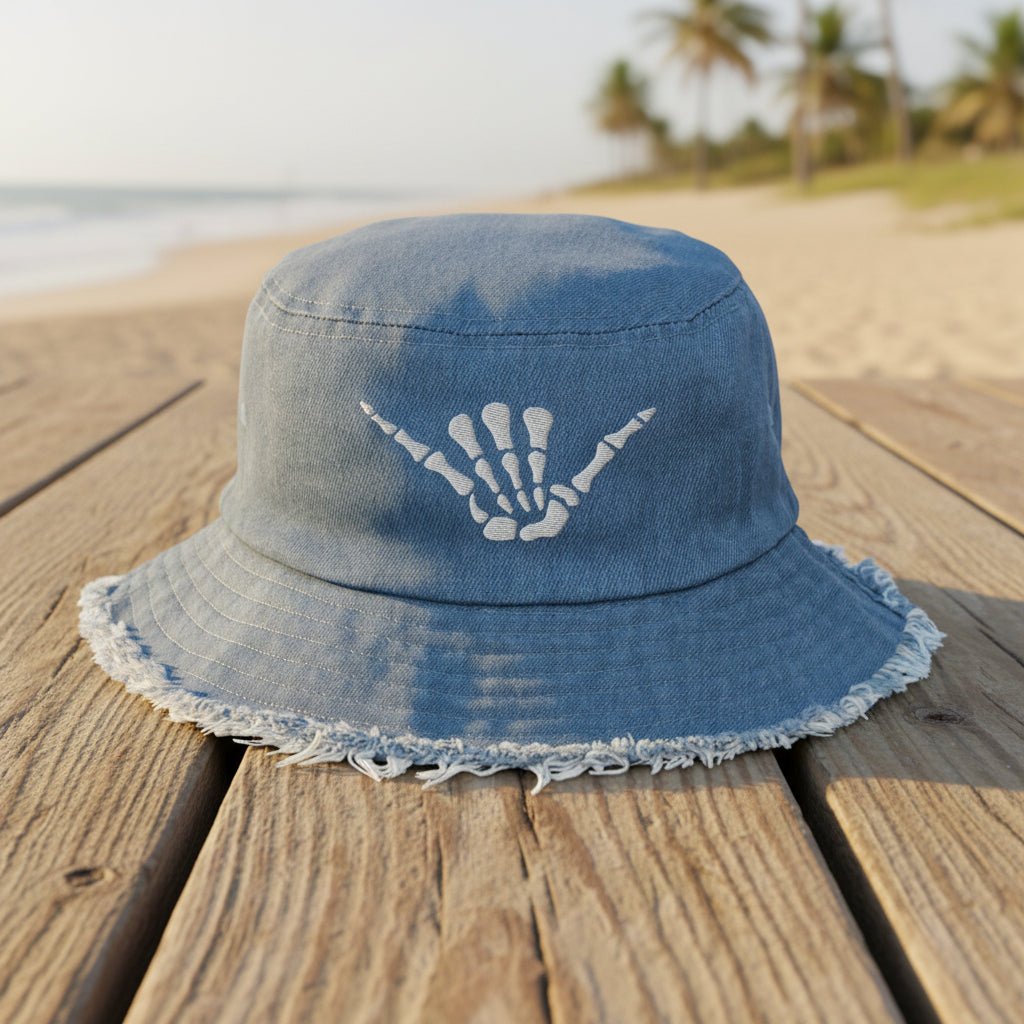 Blue denim bucket hat with embroidered shaka bones 