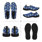 A four-panel product display of slip-on water shoes showing the top, side, and sole views. The shoes feature a gray and black floral pattern with a black textured footbed and black soles.