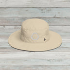 Beige sun hat with shark jaw embroidered on a white background