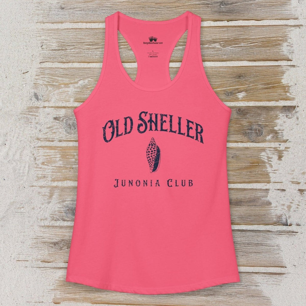 Pink tank top with 'Old Sheller Junonia Club' text on a wooden surface