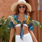 Beachwear model wearing Island style sarong over her shoulders as she makes her way down Kalãkaua Avenue in Waikiki