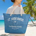 Woman holding a blue tote bag with 'St. Somewhere Caribbean Islands' and a parrot head. standing on a tropical island beach