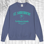 A slate blue crewneck sweatshirt with a teal graphic print reading 'ST. SOMEWHERE Caribbean Islands' and 'Where It's Warm Since 1996' on the front, displayed flat against a white wood plank background.