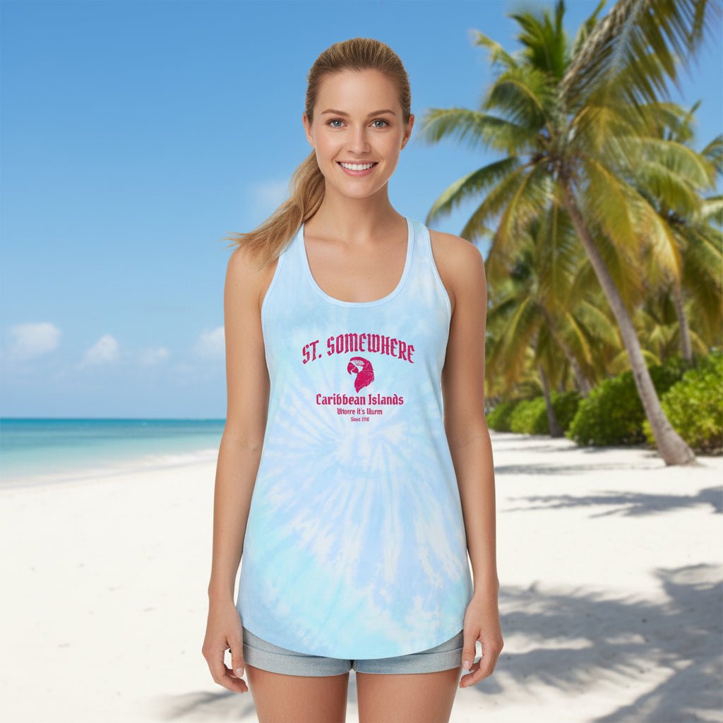 A woman stands on a sunny beach wearing a light blue and white tie-dye racerback tank top with a red graphic that reads 'ST. SOMEBEWE Caribbean Islands'.