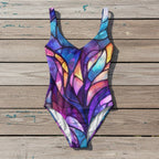 Colorful swimsuit with a stained glass design on a white background