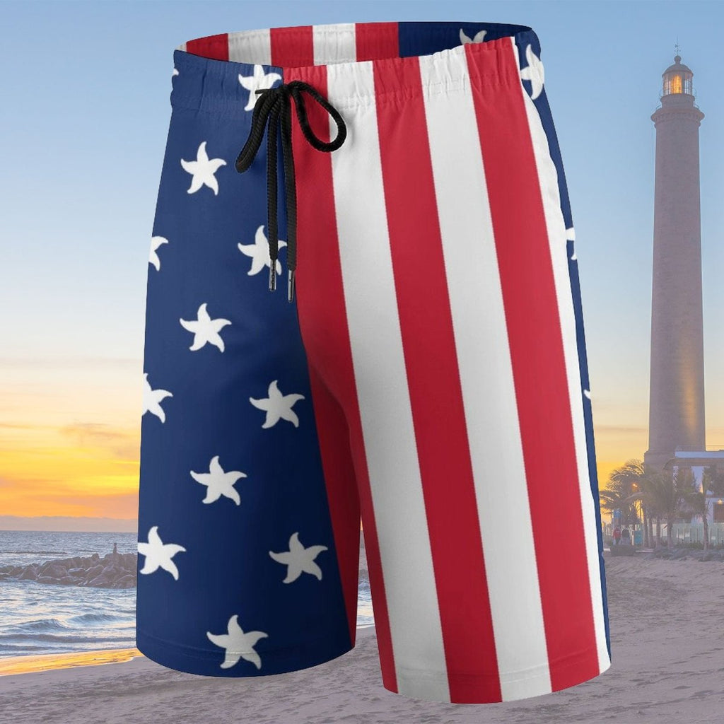 American flag-themed shorts with a lighthouse and beach in the background