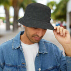 Black Bucket hat with subtle shark pattern worn by dude hanging out in Key West