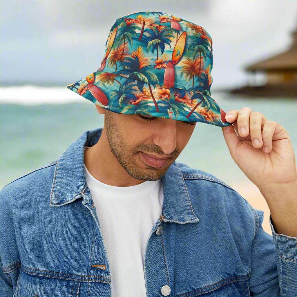 Guy wearing a Bongo Beachwear Bucket Hat for Surfers standing outside a surf shack in Hawaii