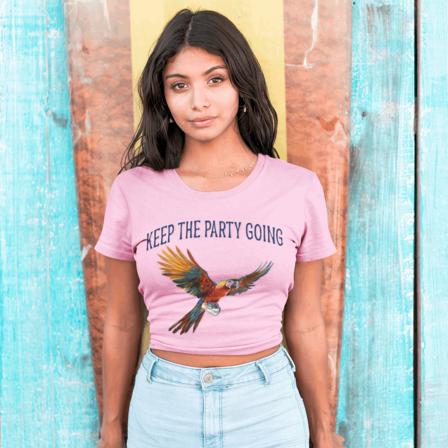 Surfer girl wearing a Parrot Head T-shirt leaning on a Surfboard