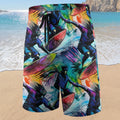 Colorful beach shorts with a surfer design on a sandy beach background