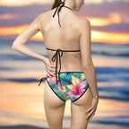 Swimsuit model walks the beach in Hawaii wearing tropical string bikini by  RonBongo