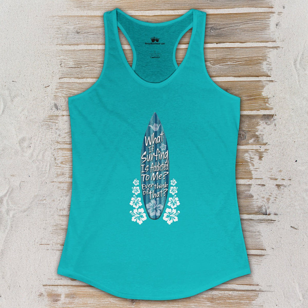 Teal tank top with a graphic design on a wooden surface