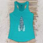 Teal tank top with a graphic design on a wooden surface