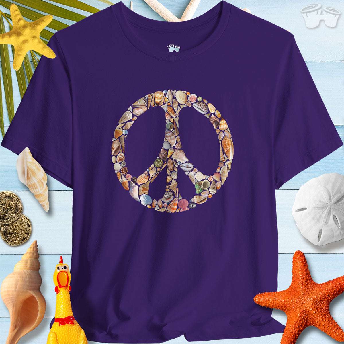 Shelling Tee featuring a peace sign made of seashells, perfect for beach lovers and summer vibes.
