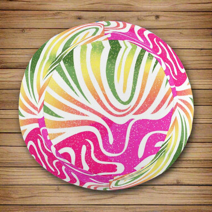 Colorful bucket hat with a vibrant coral pattern on a nautical wood  background