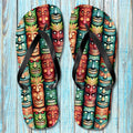 Colorful Tiki Beach Flip Flops on a wooden background